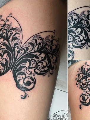 Ornamental black filigree butterfly shown from several angles