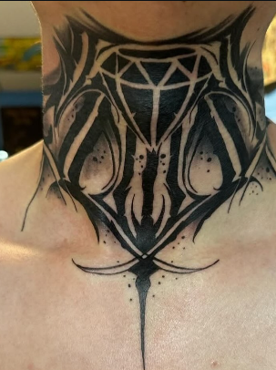 Bold blackwork tribal throat piece with a diamond centerpiece